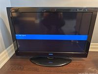 Front view of Toshiba 40-inch LCD TV displaying 'No video signal' message