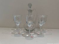 Full set front view showing decanter and five glasses