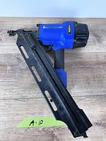 Left side view of Campbell Hausfeld blue/black framing nailer