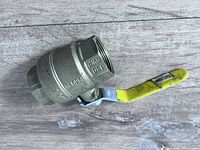 Left side view showing full valve and yellow handle