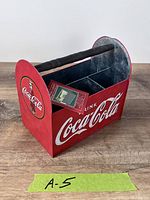 Left angled view showing full caddy with tag and logo