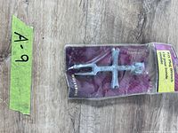 Front view of wrench in damaged package