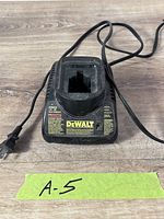 Front view of DeWalt DW9226 charger showing cord and battery slot