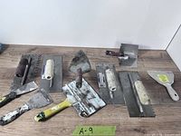 Overview of all nine drywall / plaster tools on table