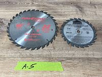 Both saw blades side by side displaying size and teeth