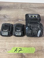 Front view of two 20V batteries and charger