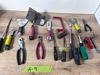 Group shot of all hand tools laid on table