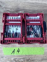 Closed view of Milwaukee red case open showing both sides with assorted bits