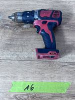 Left side view of Milwaukee cordless hammer drill, no battery attached
