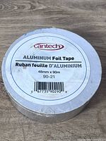 Top view of sealed roll showing Cantech label and specifications 48 mm x 90 m