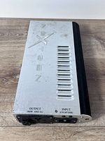 Top view of ballast showing NEXTGEN logo, ventilation slots, and finish condition