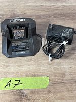 Front view of Ridgid R86093 charger and AC adapter