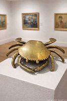 Closed brass crab sculpture viewed from above