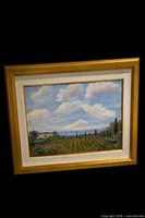 Full view of framed landscape painting