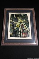 Framed serigraph showing full artwork and frame