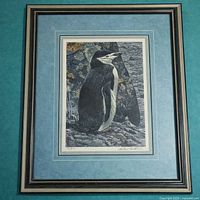 Front view of framed print showing image, matting, and frame