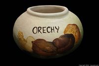 Front view of jar showing hand-painted decoration and script