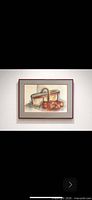 Full view of framed still life painting on wall