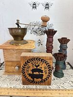 All items grouped: coffee grinder, two candlestick holders, Home Sweet Home sign