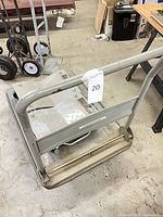 Both Pittsburgh diamond-plate dollies stacked on a cart, full view