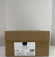 Sealed cardboard box with Amazon Basics label