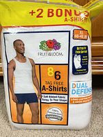 Front of sealed Fruit of the Loom 8-pack A-shirts showing size XL, bonus pack, tag-free and dual defense features