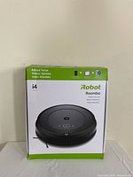 Sealed retail box showing iRobot Roomba i4 branding and image