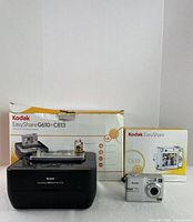 Camera, printer dock and their boxes