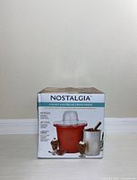 Front of boxed Nostalgia 4-Quart Electric Ice Cream Maker