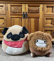 Both plush toys side by side showing overall appearance