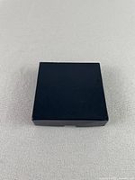 Closed navy box top view