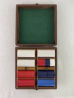 Open wooden box with chip stacks visible