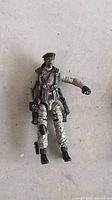 Front view of GI Joe Stalker action figure showing uniform, accessories, and articulation