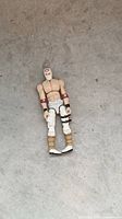 Full body view of Storm Shadow figure laid flat showing front details