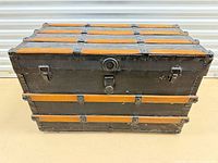 Front view showing lock, latches, wooden slats, overall condition