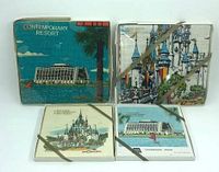 Front view of all four boxed Disney World souvenir items