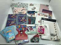 Overview of entire Disney stationery and gift-wrap lot laid out