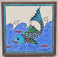 framed tile full view showing fish motif