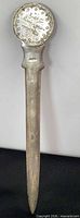 Full view of silver letter opener front