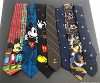 Group shot of all seven Mickey Mouse neckties