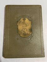 Front cover showing embossed design and year