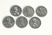 Six Lincoln steel cents obverse view