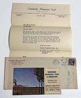 Letter, postcard and envelope laid out