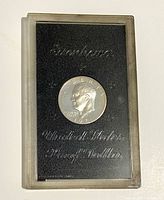 Obverse of encapsulated coin in holder