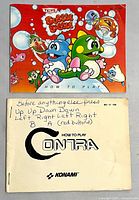 Front covers of Bubble Bobble booklet and Contra photocopy