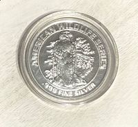 Obverse showing eagle and .999 fine silver marking