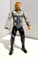Front view of Thor figure showing armor detail and hammer