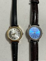 Front view of both wristwatches