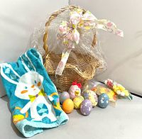 Basket, towel, decorated eggs, plush chick and craft egg bag overview