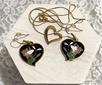 Necklace and earrings laid out together